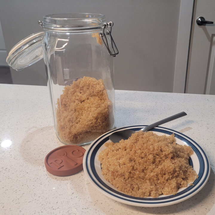 Brown Sugar on a plate and a jar of brown sugar