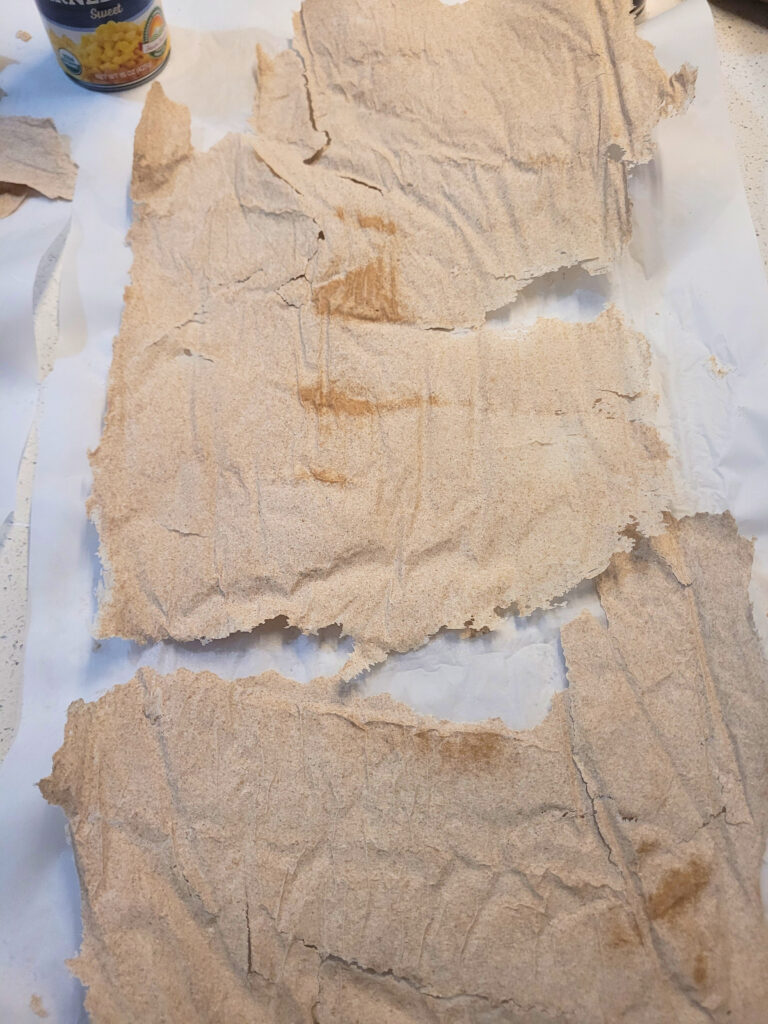 Sourdough Starter Mostly Dehydrated a sheet of dried sourdough starter with small wet spots