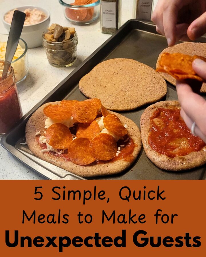 a person putting pepperoni onto their pizza next to a pan of pizza crusts