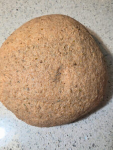 a ball of dough with a small dimple